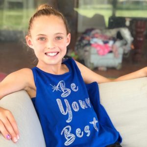 Young Gymnast wearing the Little Gym Shop Singlet Top in Blue - Be Your Best